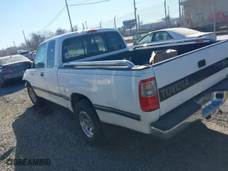 1997 Toyota T100 DX with VIN JT4TN12D9V0037897, listed as a IAAI auction lot 41737986 with 233,106 mi miles. Bid and sale history available at carsss.com. Image 3.