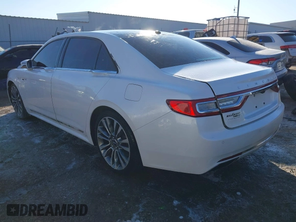 2017 Lincoln Continental Reserve with VIN 1LN6L9RP4H5609432, listed as a IAAI auction lot 41274549 with 104,742 mi miles. Bid and sale history available at carsss.com. Image 3.