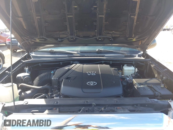 2015 Toyota Tacoma with VIN 3TMLU4EN2FM169326, listed as a IAAI auction lot 40689500 with 77,003 mi miles and . Bid and sale history available at DreamBid. Image 10.