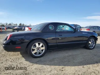 2005 Ford Thunderbird Deluxe with VIN 1FAHP60A35Y105382, listed as a Copart auction lot 88535235 with 104,112 mi miles and Salvage Title. Bid and sale history available at DreamBid. Image 3.