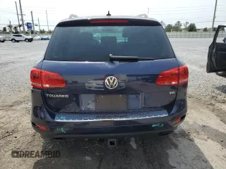 2013 Volkswagen Touareg Lux с VIN WVGEF9BP0DD002456, выставлен на аукционе Copart как лот 56034435 с пробегом 131 412 миль миль и Списание • Salvage title. История ставок и продаж доступна на DreamBid. Изображение 6.