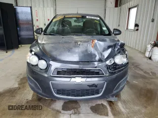 2014 Chevrolet Sonic LT z VIN 1G1JC5SH1E4118997, wystawiony jako Copart lot #70792334 z przebiegiem 166 691 mil mil oraz Szkoda całkowita • Salvage title. Historia ofert i sprzedaży dostępna na DreamBid. Obrazek 5.