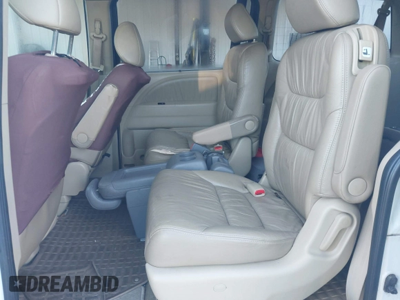 2009 Honda Odyssey EX-L with VIN 5FNRL38799B404379, listed as a IAAI auction lot 41990398 with 224,859 mi miles and . Bid and sale history available at DreamBid. Image 8.