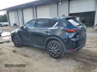 2017 Mazda CX-5 Grand Touring with VIN JM3KFBDL2H0197831, listed as a Copart auction lot 43150335 with 126,847 mi miles and Salvage Title. Bid and sale history available at carsss.com. Image 2.