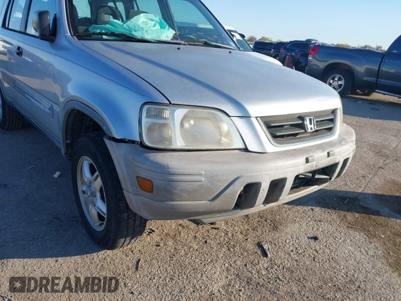 1999 Honda CR-V LX with VIN JHLRD284XXC019021, listed as a IAAI auction lot 41031098 with 204,206 mi miles. Bid and sale history available at carsss.com. Image 6.