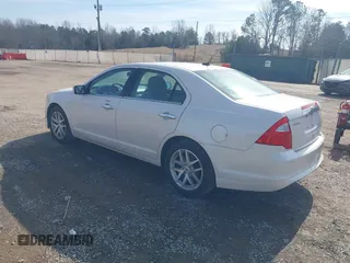 2012 Ford Fusion SEL z VIN 3FAHP0JAXCR412569, wystawiony jako IAAI lot #41420304 z przebiegiem 174 369 mil mil oraz . Historia ofert i sprzedaży dostępna na DreamBid. Obrazek 3.