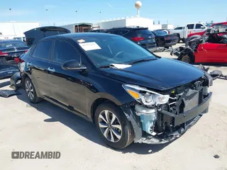 2023 Kia Rio S z VIN 3KPA24AD9PE549348, wystawiony jako IAAI lot #41727622 z przebiegiem 29 977 mil mil oraz . Historia ofert i sprzedaży dostępna na DreamBid. Obrazek 1.