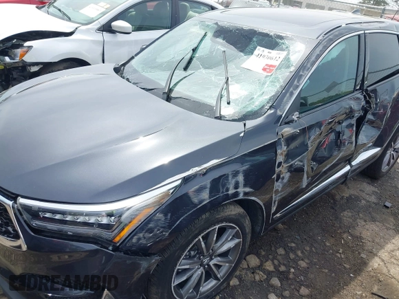 2021 Acura RDX w/Technology Package with VIN 5J8TC2H53ML048615, listed as a IAAI auction lot 41930612 with 52,218 mi miles. Bid and sale history available at carsss.com. Image 6.