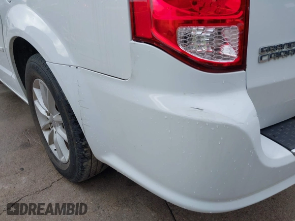 2015 Dodge Grand Caravan SXT with VIN 2C4RDGCG2FR548433, listed as a IAAI auction lot 42121256 with 161,459 mi miles and . Bid and sale history available at DreamBid. Image 13.