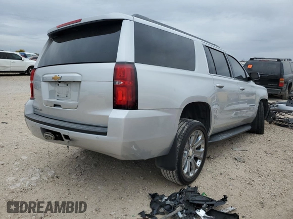 2017 Chevrolet Suburban LS with VIN 1GNSCGKC1HR320491, listed as a Copart auction lot 82842924 with Not provided miles and Salvage title. Bid and sale history available at DreamBid. Image 3.