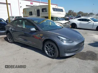 2023 Tesla Model 3 with VIN 5YJ3E1EA2PF668853, listed as a IAAI auction lot 42316581 with 16,859 mi miles and . Bid and sale history available at DreamBid. Image 1.