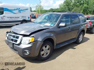 2012 Ford Escape XLT with VIN 1FMCU9D75CKC22907, listed as a IAAI auction lot 42571195 with 198,537 mi miles and . Bid and sale history available at DreamBid. Image 19.