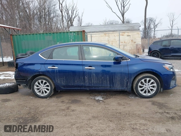 2018 Nissan Sentra SV z VIN 3N1AB7AP9JL621702, wystawiony jako IAAI lot #41345265 z przebiegiem 73 949 mil mil oraz . Historia ofert i sprzedaży dostępna na DreamBid. Obrazek 14.