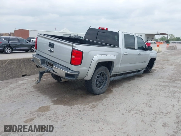 2015 Chevrolet Silverado 1500 LT with VIN 3GCUKREC8FG490856, listed as a IAAI auction lot 42067589 with 121,120 mi miles. Bid and sale history available at carsss.com. Image 4.