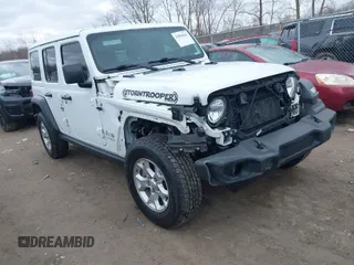 2021 Jeep Wrangler Unlimited Willys Sport with VIN 1C4HJXDG8MW596171, listed as a IAAI auction lot 41856841 with 86,353 mi miles and . Bid and sale history available at DreamBid. Image 1.