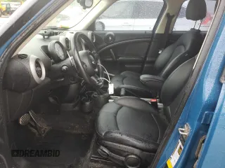 2012 MINI Countryman S z VIN WMWZC3C54CWL86184, wystawiony jako Copart lot #59289185 z przebiegiem 131 039 mil mil oraz Szkoda całkowita • Salvage title. Historia ofert i sprzedaży dostępna na DreamBid. Obrazek 7.