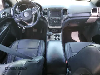 2014 Jeep Grand Cherokee Laredo with VIN 1C4RJFAG4EC210321, listed as a Copart auction lot 53574595 with 119,650 mi miles and Salvage Title. Bid and sale history available at DreamBid. Image 8.