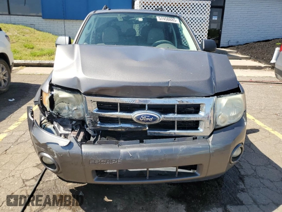 2010 Ford Escape XLT с VIN 1FMCU9D71AKC47171, выставлен на аукционе Copart как лот 57450885 с пробегом 138 317 миль миль и Чистый • Clean title. История ставок и продаж доступна на DreamBid. Изображение 5.