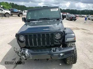 2020 Jeep Wrangler Unlimited Sahara High Altitude with VIN 1C4HJXEG1LW324669, listed as a Copart auction lot 56554095 with 42,098 mi miles and Salvage title. Bid and sale history available at DreamBid. Image 14.