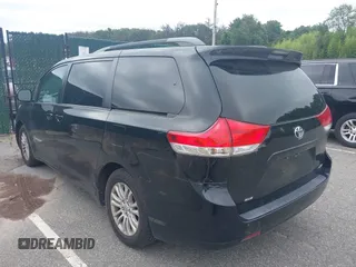 2013 Toyota Sienna XLE AAS with VIN 5TDYK3DCXDS302949, listed as a IAAI auction lot 42611370 with 236,663 mi miles and . Bid and sale history available at DreamBid. Image 3.