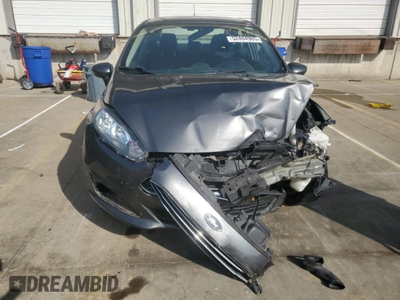 2019 Ford Fiesta SE z VIN 3FADP4BJ5KM146863, wystawiony jako Copart lot #52404965 z przebiegiem 61 286 mil mil oraz Szkoda całkowita • Salvage title. Historia ofert i sprzedaży dostępna na DreamBid. Obrazek 5.