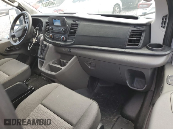 2023 Ford Transit with VIN 1FTBW1YG7PKB75200, listed as a Copart auction lot 60850425 with 59,145 mi miles and Salvage title. Bid and sale history available at DreamBid. Image 8.