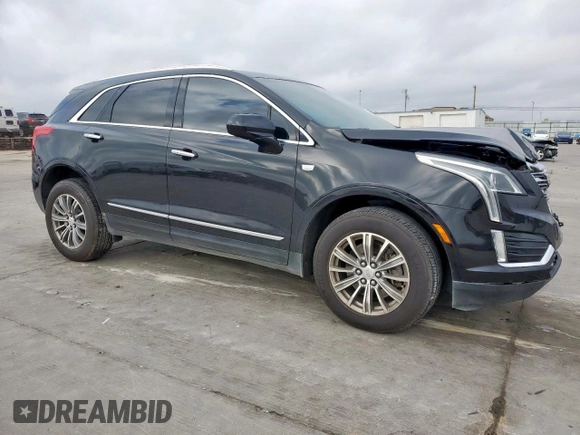 2019 Cadillac XT5 Luxury FWD with VIN 1GYKNCRS1KZ271223, listed as a Copart auction lot 50874195 with 29,843 mi miles and Salvage Title. Bid and sale history available at DreamBid. Image 4.