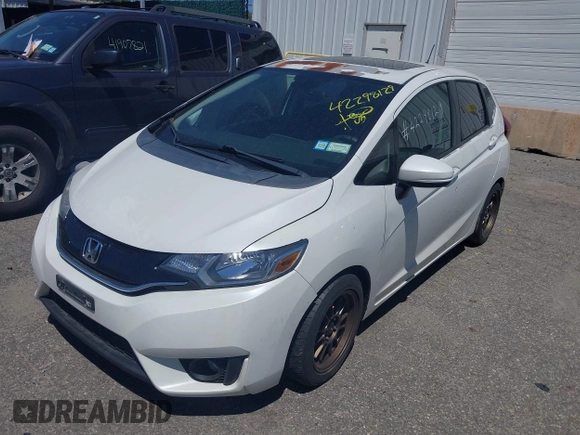 2015 Honda Fit EX z VIN 3HGGK5G84FM733886, wystawiony jako IAAI lot #42298129 z przebiegiem 84 383 mil mil oraz . Historia ofert i sprzedaży dostępna na DreamBid. Obrazek 18.