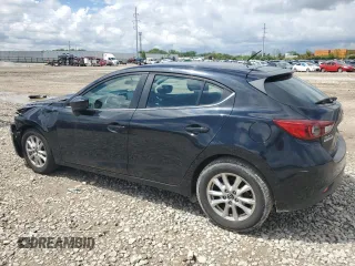 2015 Mazda 3 i Touring with VIN 3MZBM1L76FM208057, listed as a Copart auction lot 56818335 with 112,457 mi miles and Salvage title. Bid and sale history available at DreamBid. Image 2.