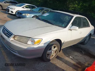 2001 Toyota Camry CE with VIN JT2BG22K010570556, listed as a IAAI auction lot 42458031 with 357,046 mi miles and . Bid and sale history available at DreamBid. Image 2.