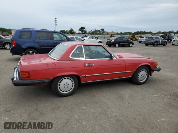 1989 Mercedes-Benz 560 SL с VIN WDBBA48D5KA103768, выставлен на аукционе Copart как лот 71965504 с пробегом 93 239 миль миль и Списание • Salvage title. История ставок и продаж доступна на DreamBid. Изображение 3.