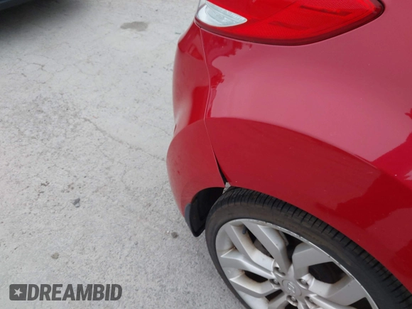 2012 Hyundai Veloster w/Black Int with VIN KMHTC6AD7CU072850, listed as a IAAI auction lot 41868715 with 141,792 mi miles and . Bid and sale history available at DreamBid. Image 6.