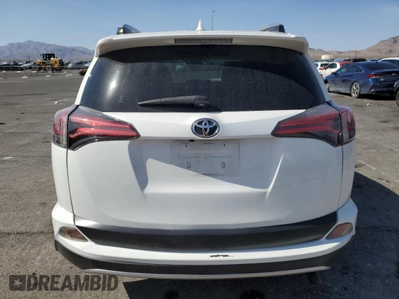 2018 Toyota RAV4 XLE with VIN JTMWFREV0JD123910, listed as a Copart auction lot 52416115 with 84,096 mi miles and Salvage Title. Bid and sale history available at carsss.com. Image 6.