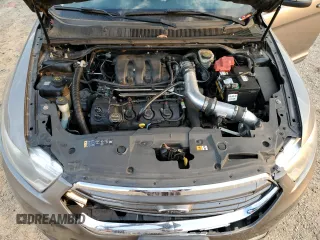 2014 Ford Taurus Limited с VIN 1FAHP2J86EG136636, выставлен на аукционе Copart как лот 49557385 с пробегом 154 065 миль миль и Списание • Salvage title. История ставок и продаж доступна на DreamBid. Изображение 12.