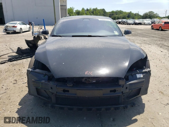 2016 Tesla Model S 90D с VIN 5YJSA1E26GF167934, выставлен на аукционе Copart как лот 57664115 с пробегом 151 583 миль миль и Списание • Salvage title. История ставок и продаж доступна на DreamBid. Изображение 5.