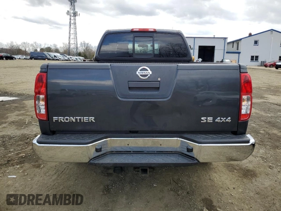 2010 Nissan Frontier SE with VIN 1N6AD0CWXAC448221, listed as a Copart auction lot 50592235 with 59,055 mi miles and Salvage title. Bid and sale history available at DreamBid. Image 6.