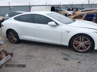 2016 Tesla Model S 90D with VIN 5YJSA1E40GF123543, listed as a IAAI auction lot 42111603 with 126,445 mi miles and . Bid and sale history available at DreamBid. Image 12.