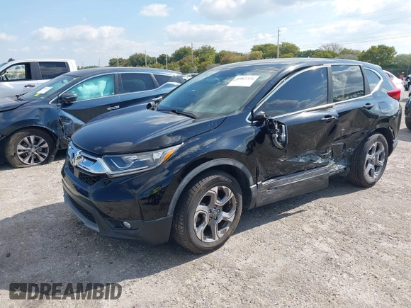 2017 Honda CR-V EX-L with VIN 7FARW1H80HE004721, listed as a IAAI auction lot 42063324 with 33,226 mi miles. Bid and sale history available at carsss.com. Image 2.