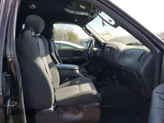 2003 Ford F-150 XL with VIN 1FTRX17W53NB00671, listed as a IAAI auction lot 41576739 with 194,066 mi miles. Bid and sale history available at carsss.com. Image 5.