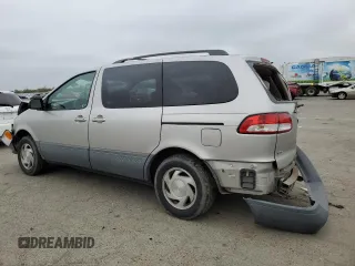 2001 Toyota Sienna LE with VIN 4T3ZF13C71U399066, listed as a Copart auction lot 85601134 with 81,233 mi miles and Salvage Title. Bid and sale history available at carsss.com. Image 2.