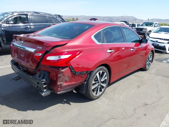 2016 Nissan Altima 2.5 SL with VIN 1N4AL3AP4GC122089, listed as a IAAI auction lot 41965851 with 121,608 mi miles. Bid and sale history available at carsss.com. Image 4.
