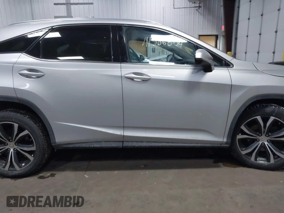2017 Lexus RX with VIN 2T2BZMCAXHC067275, listed as a IAAI auction lot 41386504 with 100,477 mi miles. Bid and sale history available at carsss.com. Image 13.
