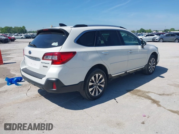 2018 Subaru Outback Touring with VIN 4S4BSATC5J3336205, listed as a IAAI auction lot 42201530 with 103,362 mi miles and . Bid and sale history available at DreamBid. Image 4.
