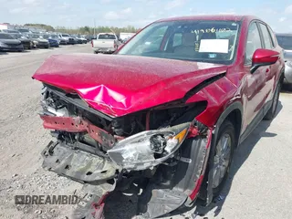 2016 Mazda CX-5 Sport with VIN JM3KE2BY9G0911535, listed as a IAAI auction lot 41906402 with 134,477 mi miles. Bid and sale history available at carsss.com. Image 6.