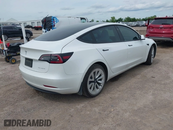 2022 Tesla Model 3 Long Range z VIN 5YJ3E1EB7NF241075, wystawiony jako IAAI lot #42217269 z przebiegiem 28 856 mil mil oraz . Historia ofert i sprzedaży dostępna na DreamBid. Obrazek 4.