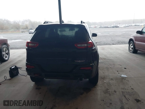 2014 Jeep Cherokee Trailhawk with VIN 1C4PJMBS3EW150366, listed as a IAAI auction lot 41971035 with 90,994 mi miles. Bid and sale history available at carsss.com. Image 15.
