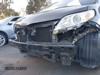 2018 Toyota Sienna L with VIN 5TDZZ3DC0JS965524, listed as a IAAI auction lot 41608423 with 63,815 mi miles and . Bid and sale history available at DreamBid. Image 6.