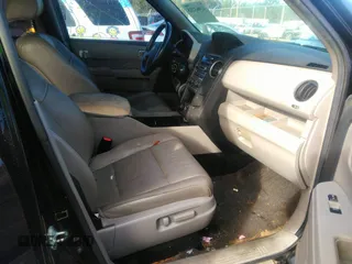 2012 Honda Pilot Touring with VIN 5FNYF3H90CB035309, listed as a IAAI auction lot 41063215 with 228,081 mi miles and . Bid and sale history available at carsss.com. Image 5.