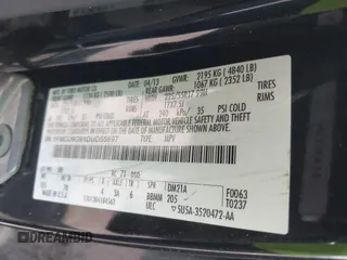 2013 Ford Escape SE z VIN 1FMCU9G91DUD55697, wystawiony jako IAAI lot #42184822 z przebiegiem 139 594 mil mil oraz . Historia ofert i sprzedaży dostępna na DreamBid. Obrazek 9.