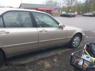 1999 Acura RL with VIN JH4KA9658XC007198, listed as a IAAI auction lot 42112631 with 92,166 mi miles. Bid and sale history available at carsss.com. Image 17.